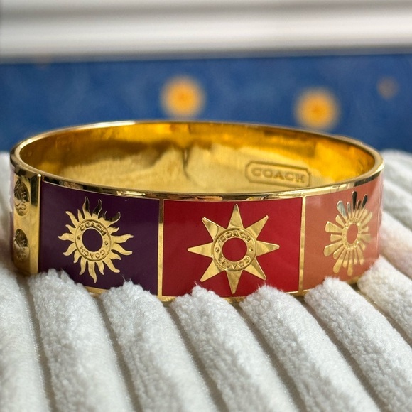 Coach Jewelry - 533. Coach Limited Tony Duquette Sunburst Gold Bangle. Measures 7.5”.